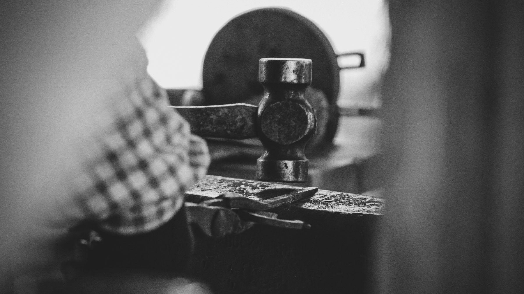 Hammer and tools on a workbench